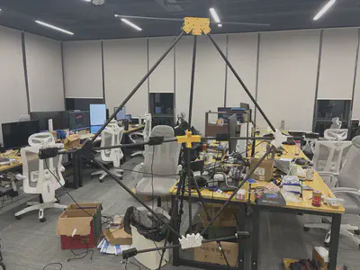 Carbon-fiber tetrahedral rig · 8 stereo modules surrounding the subject area